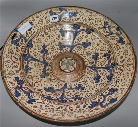 A 17th Century Hispano Moresque dish with central maltese cross